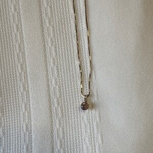 Elegant Gold Necklace with Pink Ice Pendant